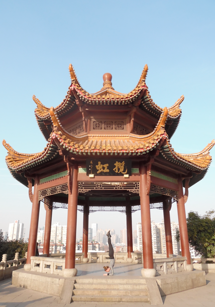 Pincha Mayurasana in a Pagoda at The Yellow Crane Tower